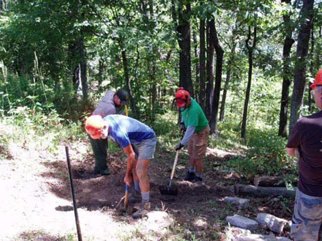 PATCers and NPS staff graded the tread for a new check dam
